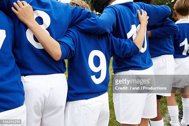 boys in a line from behind - rugby sport stock pictures, royalty-free photos & images