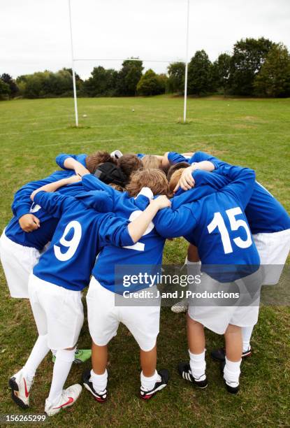 boys in a rugby scrum - rugby union fotografías e imágenes de stock