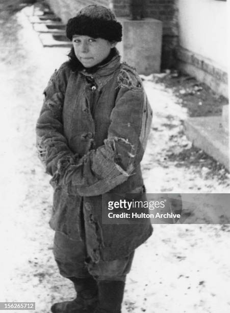 Homeless peasant boy in Moscow after the man-made Holodomor famine in the Ukraine, former Soviet Union, Spring 1934.
