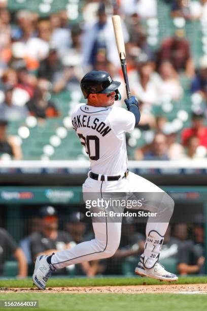 Spencer Torkelson of the Detroit Tigers hits an RBI single during the first inning against the San Francisco Giants at Comerica Park on July 24, 2023...