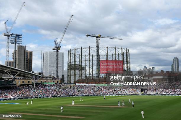 England's Jonny Bairstow faces Australia's Mitchell Starc in front of the famous gas holder on day three of the fifth Ashes cricket Test match...