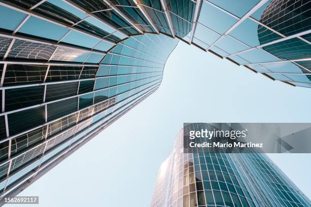 looking up view of futuristic building - 建築上の特徴 ストックフォトと画像