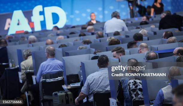 Delegates sit in foldable voting boot during the European Election Assembly of the German far-right Alternative for Germany party at the AfD's...