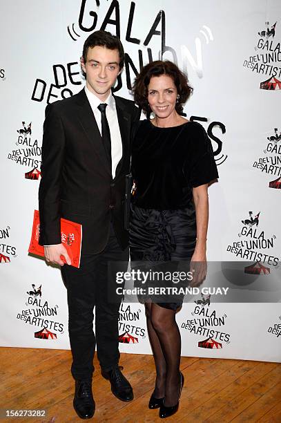 French actress Elizabeth Bourgine and her son Jules pose on arrival to the 50th edition of the "Gala de l'union des Artistes" held at the Alexis...