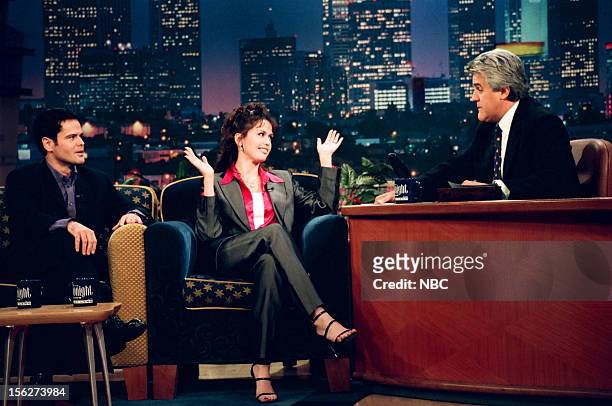 Episode 1450 -- Pictured: Donny Osmond and Marie Osmond during an interview with host Jay Leno on September 14, 1998 --