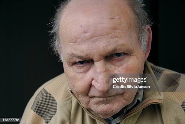 grumpy old man - grumpy old man stock pictures, royalty-free photos & images