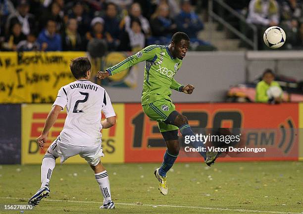 Steve Zakuani of the Seattle Sounders heads the ball as Todd Dunivant of the Los Angeles Galaxy looks on in the second half of Leg 1 of the Western...