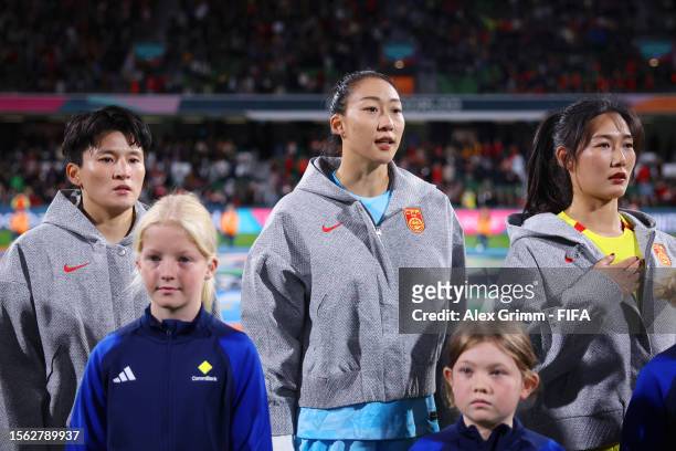 Wang Shanshan, Xu Huan and Yang Lina of China PR line up for the national anthem prior to the FIFA Women's World Cup Australia & New Zealand 2023...