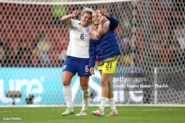 Millie Bright and Ellie Roebuck of England react following the FIFA Women's World Cup Australia & New Zealand 2023 Group D match between England and...