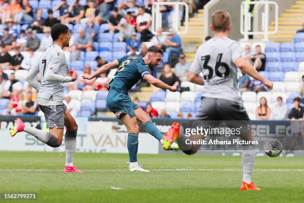 Matt Grimes of Swansea City scores a goal during the pre-season friendly match between Reading and Swansea City at the Select Car Leasing Stadium on...