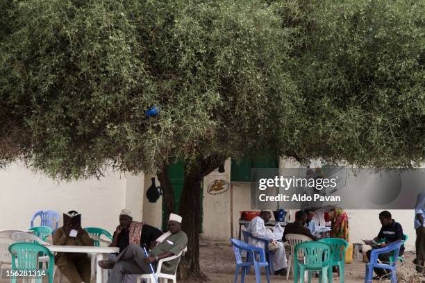 people sitting at the coffee. - hargeisa stock pictures, royalty-free photos & images