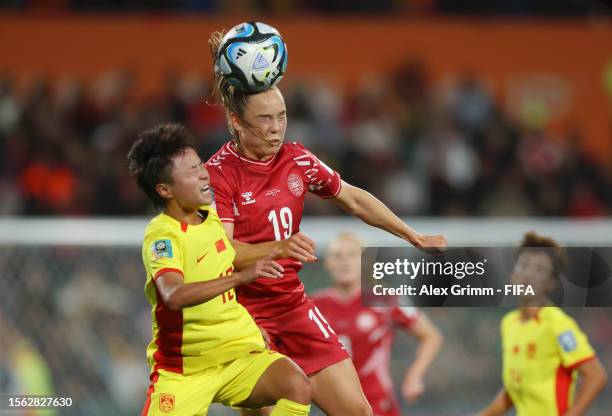 Janni Thomsen of Denmark and Zhang Linyan of China PR compete for the ball during the FIFA Women's World Cup Australia & New Zealand 2023 Group D...