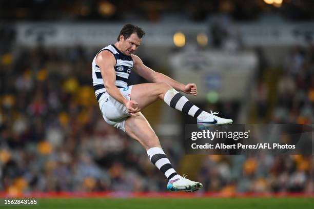 Patrick Dangerfield of the Cats kicks a goal during the round 19 AFL match between Brisbane Lions and Geelong Cats at The Gabba, on July 22 in...