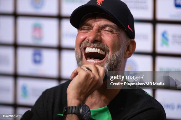 Manager Jurgen Klopp of Liverpool FC laughs at a joke during the Pre-match Conference at the National Stadium on July 29, 2023 in Singapore.