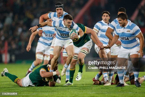 Argentina's wing Mateo Carreras runs with the ball during the Rugby Championship final-round match between South Africa and Argentina at Ellis Park...