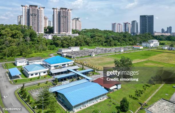 drone view of a sewage treatment plant in the city - estado de selangor fotografías e imágenes de stock
