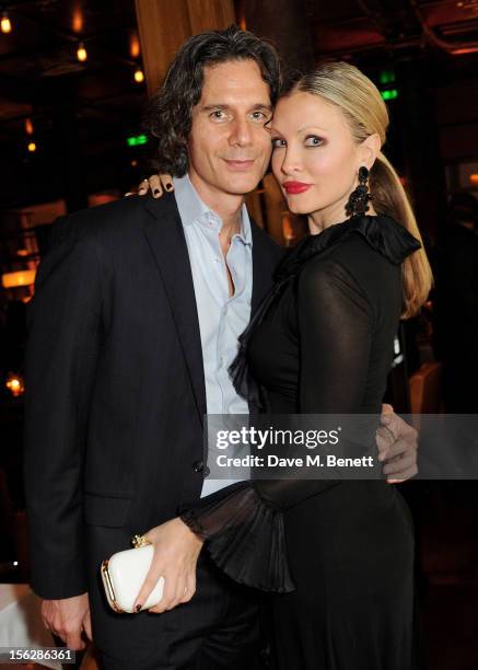 Ty Comfort and Caprice attend the de Grisogono private dinner at 17 Berkeley St on November 12, 2012 in London, England.