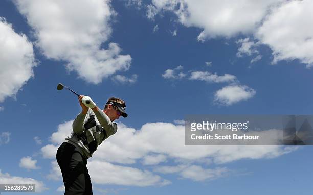 Ian Poulter of England tees off on the driving range during previews ahead of the 2012 Australian Masters at Kingston Heath Golf Club on November 13,...