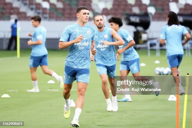 Phil Foden of Manchester City in action during the Manchester City training session at National Stadium on July 22, 2023 in Tokyo, Japan.