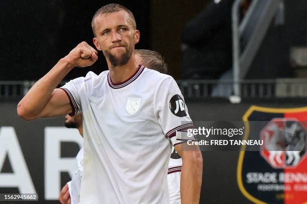 West Ham United's Czech midfielder Tomas Soucek reacts after scoring a first goal for his team during the pre-season friendly football match between...