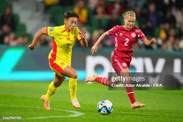 Wang Shuang of China PR controls the ball against Josefine Hasbo of Denmark during the FIFA Women's World Cup Australia & New Zealand 2023 Group D...