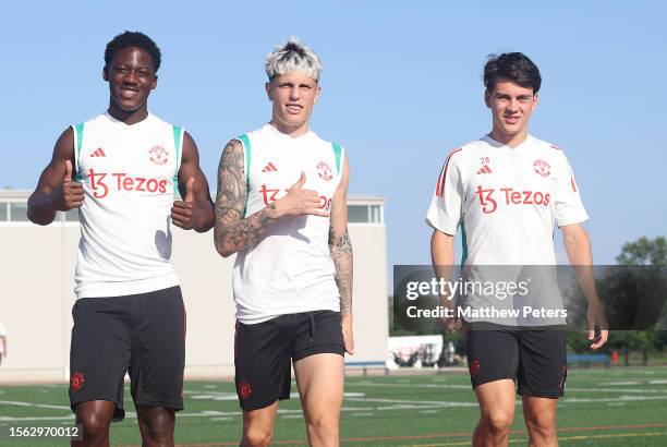 Kobbie Mainoo, Alejandro Garnacho, Facundo Pellistri of Manchester United in action during a pre-season training session at Pingry School on July 21,...