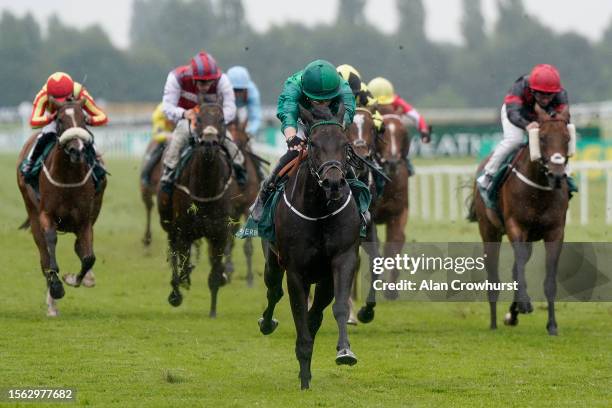 Tom Marquand riding Relief Rally win The Weatherbys Super Sprint Stakes at Newbury Racecourse on July 22, 2023 in Newbury, England.