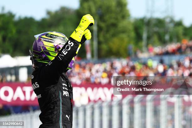 Pole position qualifier Lewis Hamilton of Great Britain and Mercedes celebrates in parc ferme during qualifying ahead of the F1 Grand Prix of Hungary...