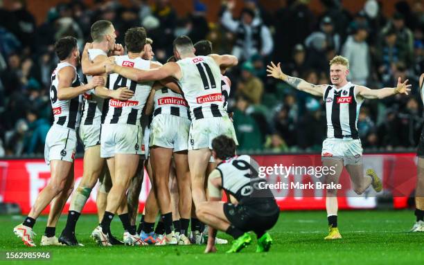Collingwood celebrate the final siren during the round 19 AFL match between Port Adelaide Power and Collingwood Magpies at Adelaide Oval, on July 22...
