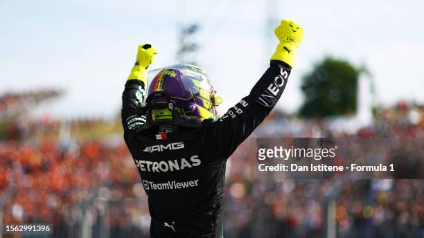 Pole position qualifier Lewis Hamilton of Great Britain and Mercedes celebrates in parc ferme during qualifying ahead of the F1 Grand Prix of Hungary...
