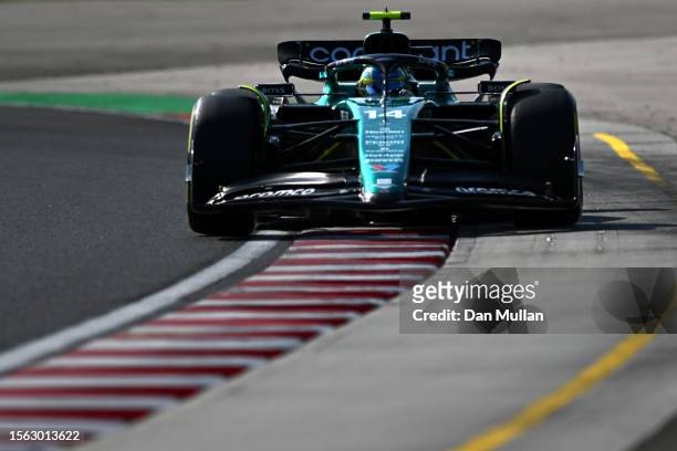 Fernando Alonso of Spain driving the Aston Martin AMR23 Mercedes on track during qualifying ahead of the F1 Grand Prix of Hungary at Hungaroring on...