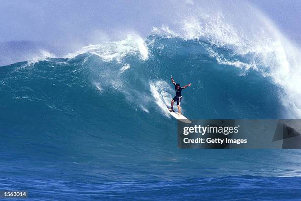 Makua Rothman drops into a 4-meter wave at the Rip Curl Cup at Sunset Beach on the North Shore of Oahu today. The young Hawaiian advanced to the...