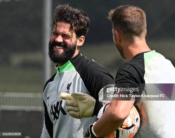 Alisson Becker and Adrian of Liverpool during a training session on July 22, 2023 in UNSPECIFIED, Germany.