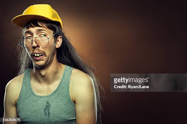 goofy skeptical redneck with mullet - ugliness stock pictures, royalty-free photos & images