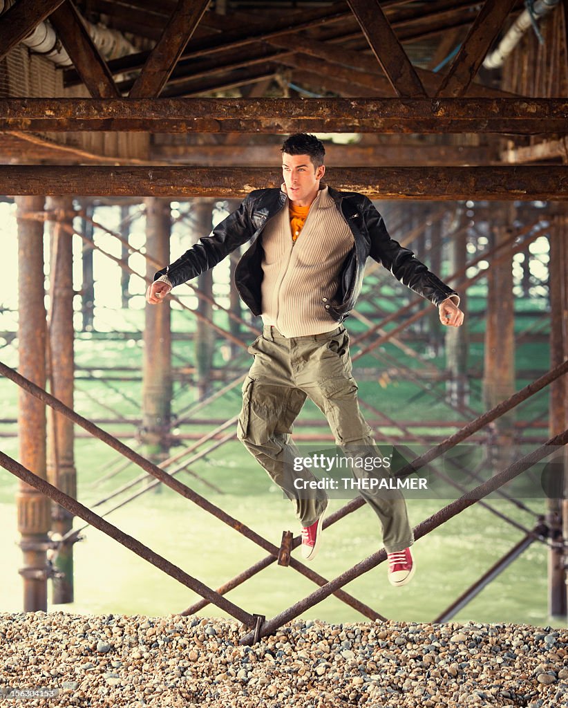 Young man jumping and goofing around