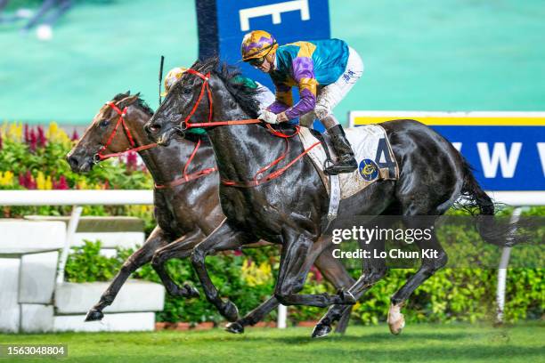 Jockey Zac Purton riding Simple Hedge wins the Race 10 All You Wish Handicap at Sha Tin Racecourse on July 16, 2023 in Hong Kong.