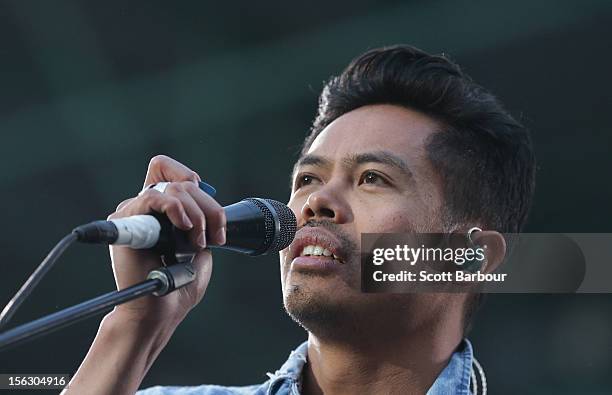 Dougy Mandagi of The Temper Trap performs on stage as the opening act for Cold Play at Etihad Stadium on November 13, 2012 in Melbourne, Australia.