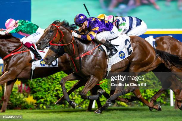 Jockey Zac Purton riding Golden Express wins the Race 11 Joy And Fun Handicap at Sha Tin Racecourse on July 16, 2023 in Hong Kong.