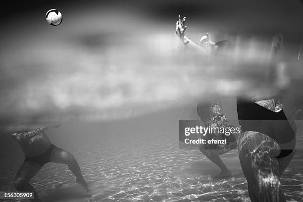 people playing volleyball in water - 3 men looking up stock pictures, royalty-free photos & images