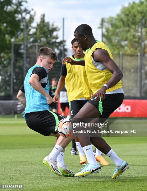 Ben Doak and Ibrahima Konate of Liverpool during a training session on July 22, 2023 in UNSPECIFIED, Germany.