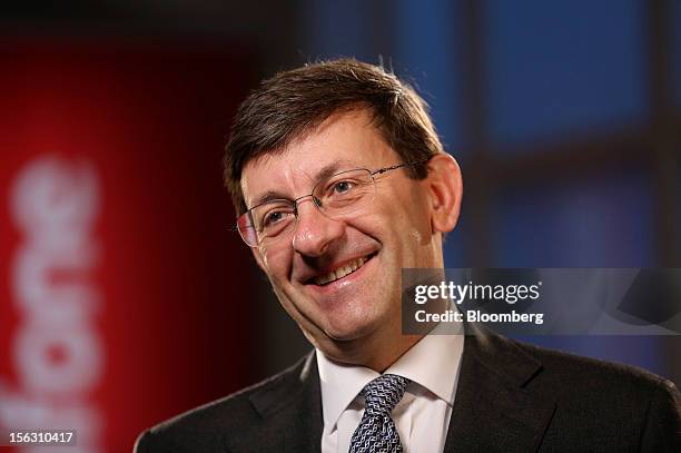 Vittorio Colao, chief executive officer of Vodafone Group Plc, smiles during a Bloomberg Television interview interview in London, U.K., on Tuesday,...