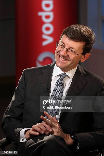 Vittorio Colao, chief executive officer of Vodafone Group Plc, reacts during a Bloomberg Television interview in London, U.K., on Tuesday, Nov. 13,...