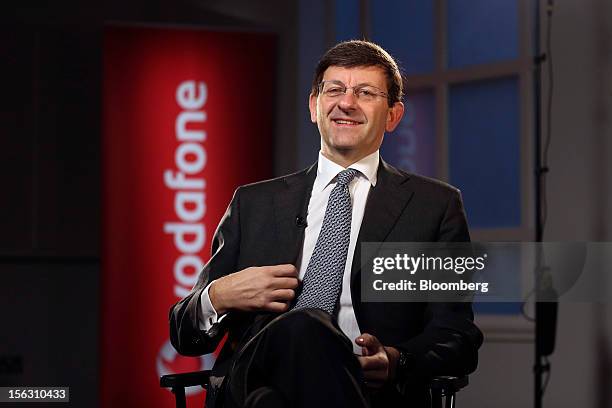 Vittorio Colao, chief executive officer of Vodafone Group Plc, reacts during a Bloomberg Television interview in London, U.K., on Tuesday, Nov. 13,...
