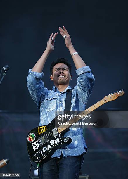 Dougy Mandagi of The Temper Trap performs on stage as the opening act for Cold Play at Etihad Stadium on November 13, 2012 in Melbourne, Australia.