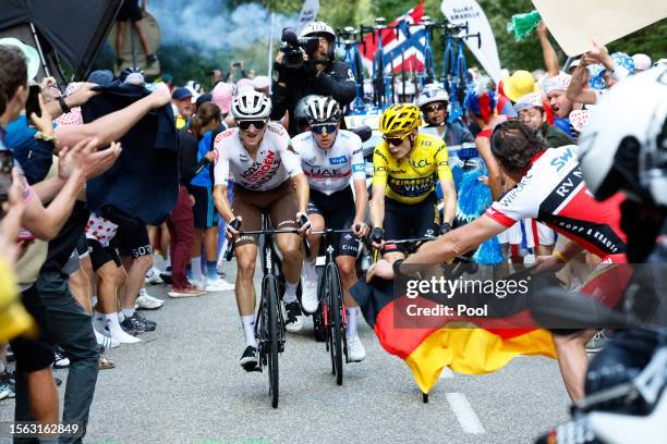 Felix Gall of Austria and Ag2R Citroën Team, Tadej Pogacar of Slovenia and UAE Team Emirates - White best young jersey and Jonas Vingegaard of...