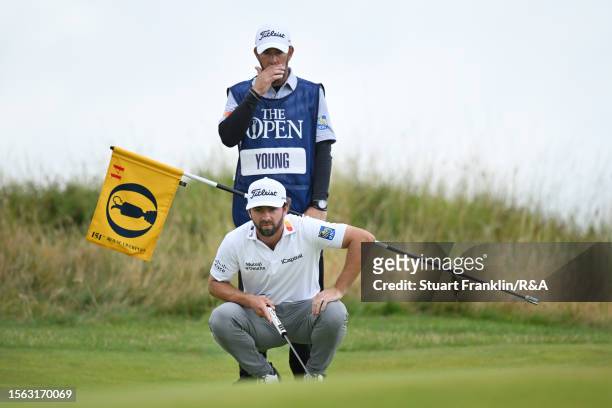 Cameron Young of the United States looks on alongside their caddy during Day Three of The 151st Open at Royal Liverpool Golf Club on July 22, 2023 in...