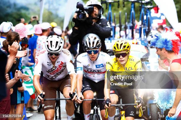 Felix Gall of Austria and Ag2R Citroën Team, Tadej Pogacar of Slovenia and UAE Team Emirates - White best young jersey and Jonas Vingegaard of...