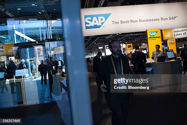 Visitor exits an SAP AG pavilion on the opening day of the Sapphire Now and TechEd conference in Madrid, Spain, on Tuesday, Nov. 13, 2012. SAP plans...