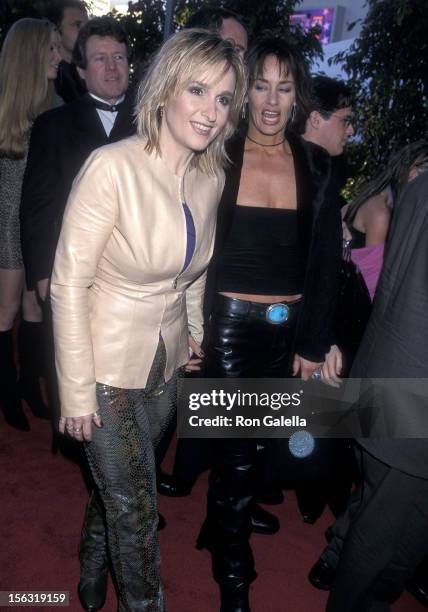 Singer Melissa Etheridge and girlfriend Julie Cypher attend the 42nd Annual Grammy Awards on February 23, 2000 at the Staples Center in Los Angeles,...