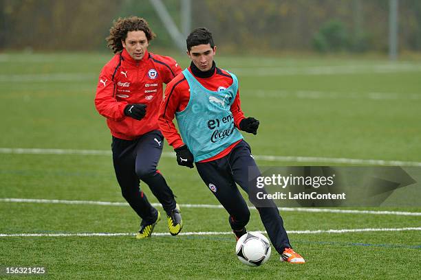 Manuel Iturra and Felipe Gutierrez of Chile during a training session at Spiserwies stadium November 13, 2012 in Sait Gallen, Switzerland. Chile will...